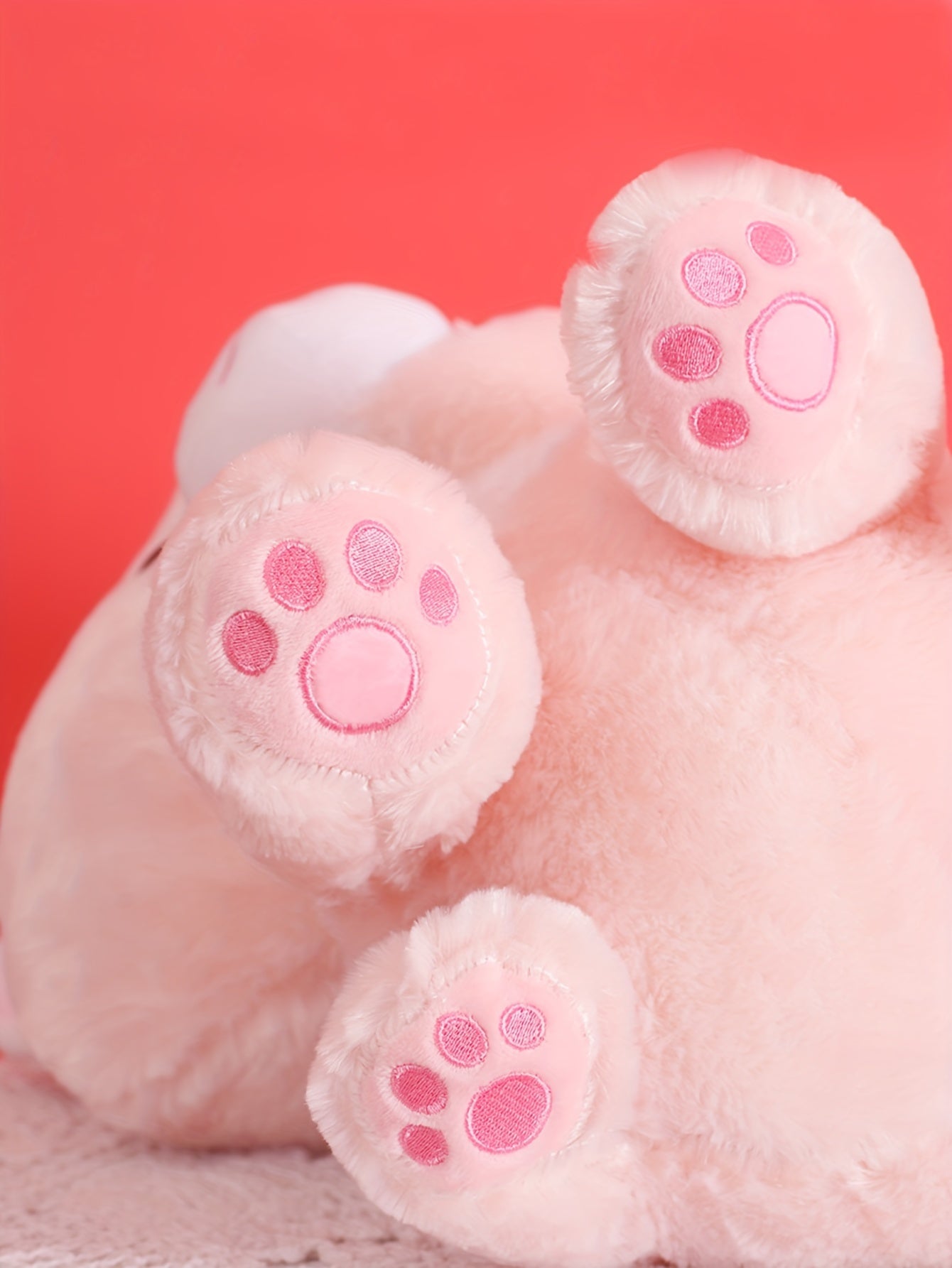 An adorable sitting New Year's cake cat plush toy doll, creative soft and cute cat pillow cat doll birthday creative gift home decoration