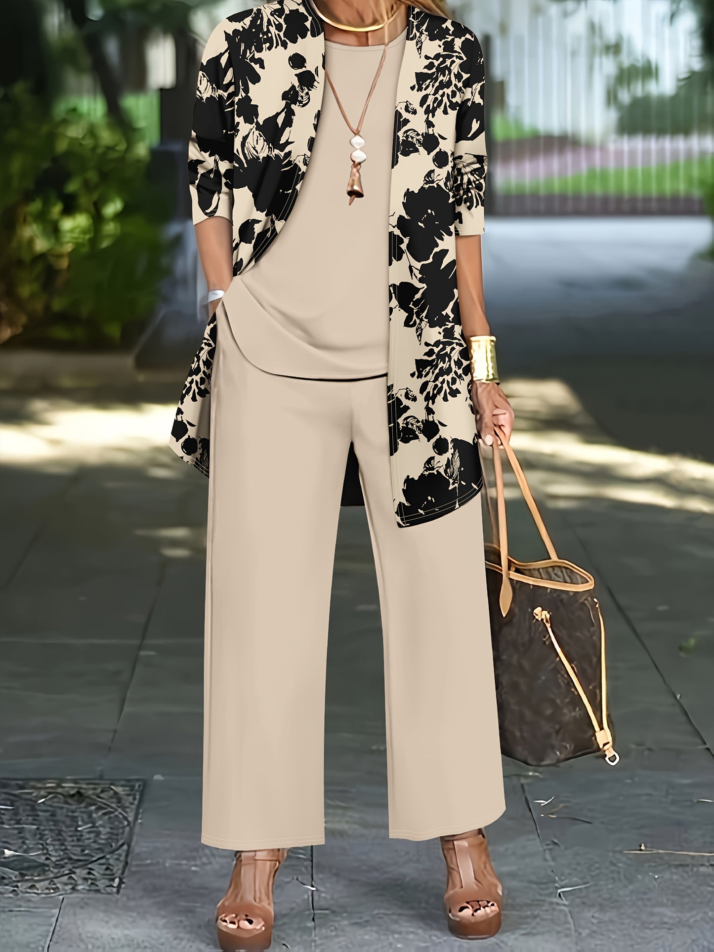Plus Size, A three-piece set of elegant and unique female plus-size floral printed top and solid-colored vest and trousers