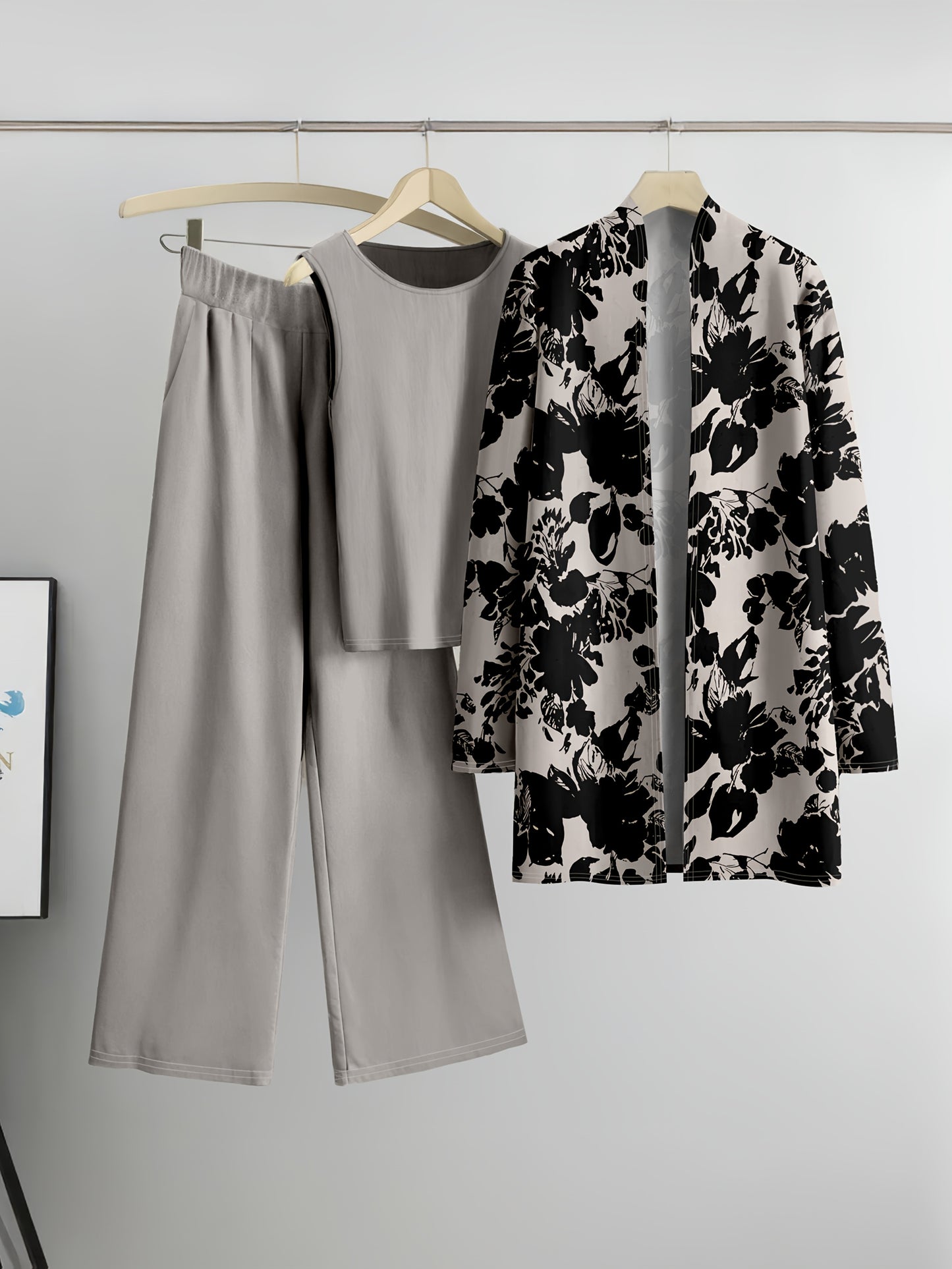 Plus Size, A three-piece set of elegant and unique female plus-size floral printed top and solid-colored vest and trousers