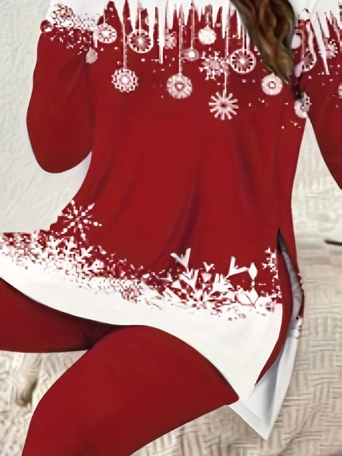 Women's long-sleeved round neck top with side slit and fitted trousers set, red white color block design. Romantic winter theme outfit featuring sparkling snowflake patterns in a cutout style for an energetic look. Made of st