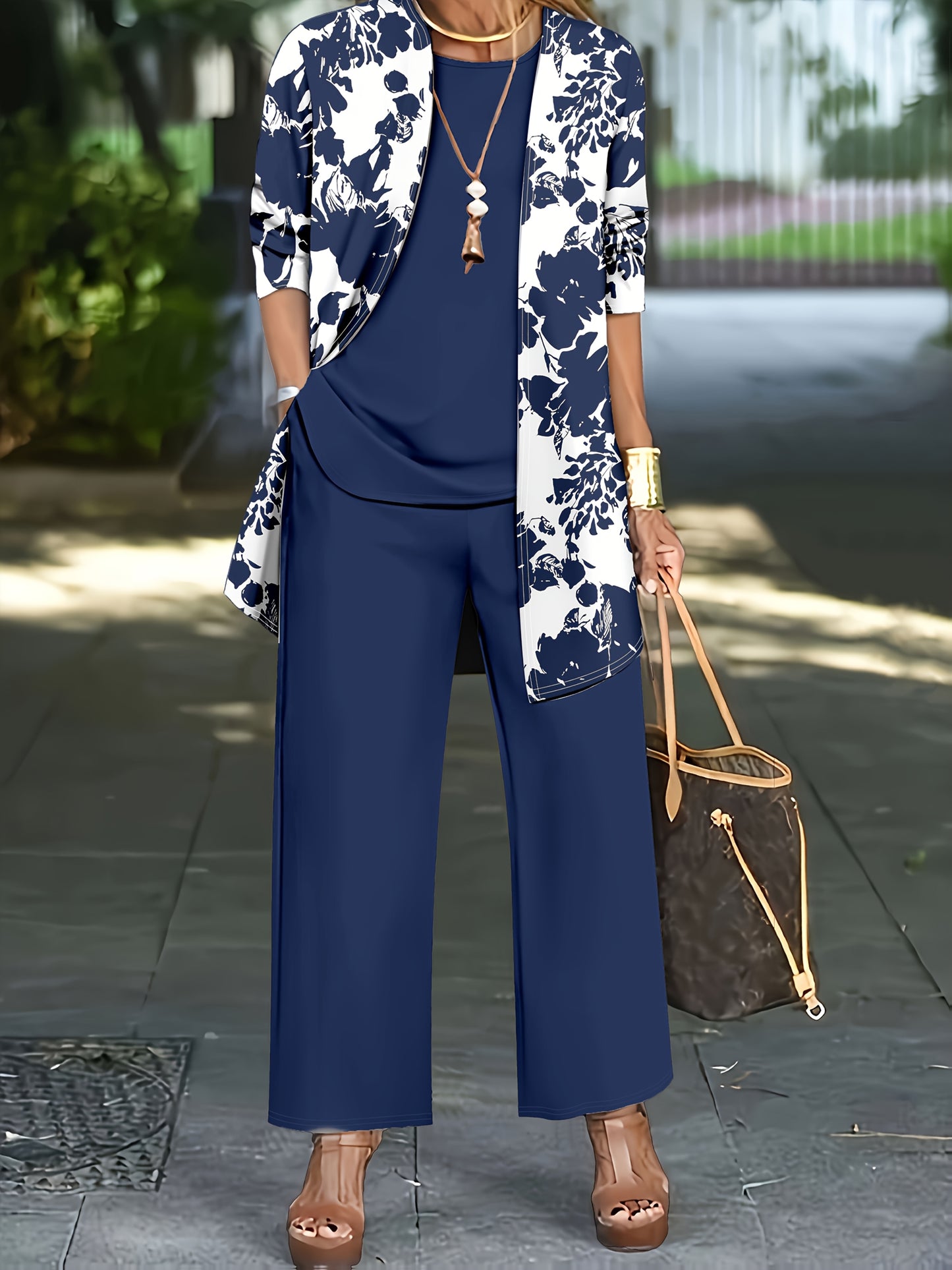 Plus Size, A three-piece set of elegant and unique female plus-size floral printed top and solid-colored vest and trousers