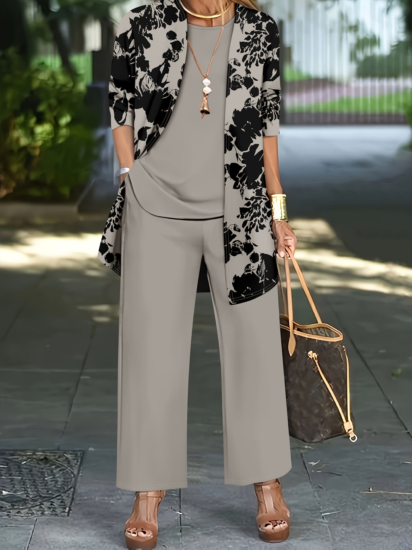 Plus Size, A three-piece set of elegant and unique female plus-size floral printed top and solid-colored vest and trousers
