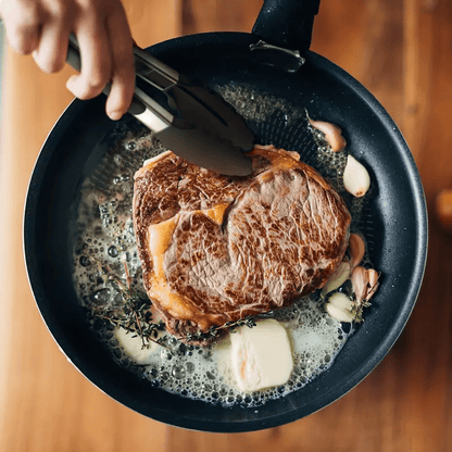 Sturdy Kitchen Tongs Made of Stainless Steel with Silicone Ends - Resistant to Heat, Equipped with a Locking Feature for a Secure Grip, Offered in Lengths of 17.78 cm, 22.86 cm, And 30.48 cm, in Black.