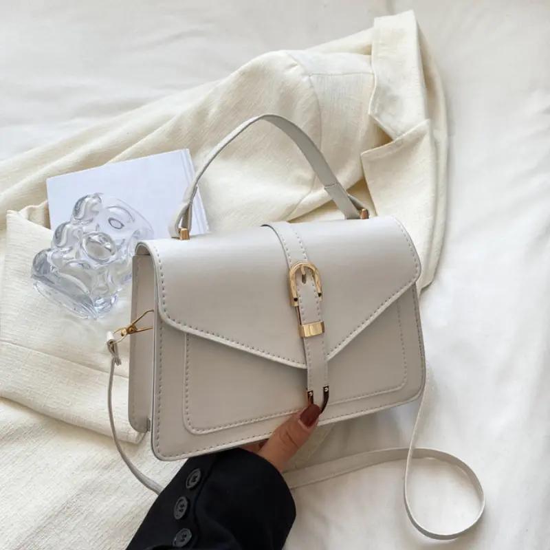 Stylish Minimalist Crossbody Bag Featuring a Top Handle And Flap for Women - a Plain Square Purse with a Straightforward Design