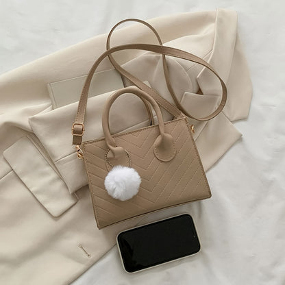 Stylish Blue Square Bag with a Chevron Design And a Bag Charm