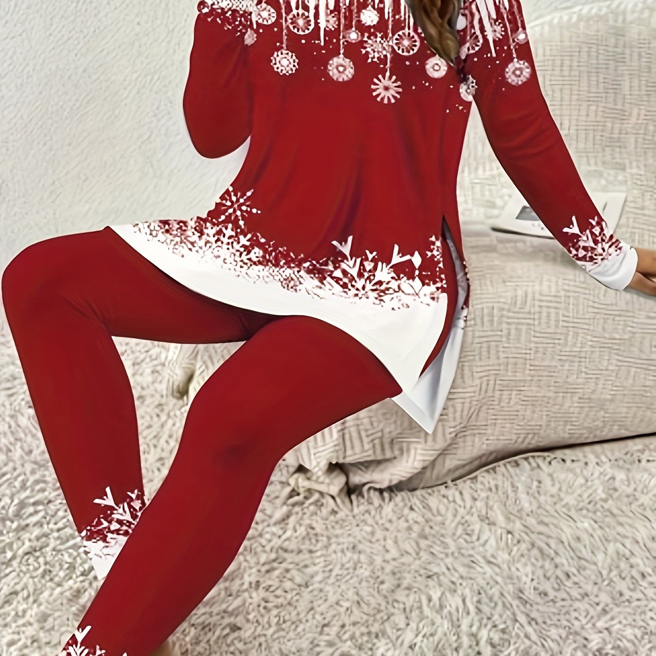 Women's long-sleeved round neck top with side slit and fitted trousers set, red white color block design. Romantic winter theme outfit featuring sparkling snowflake patterns in a cutout style for an energetic look. Made of st