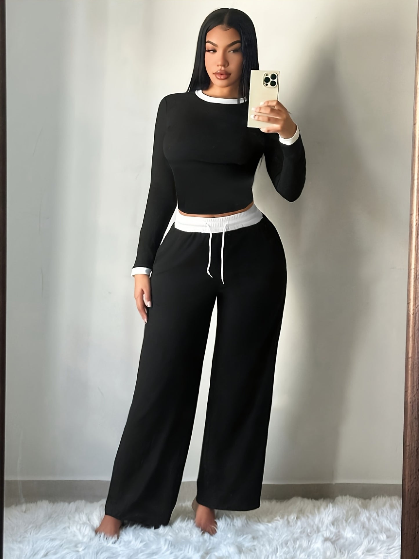 A Two-Piece Set Featuring a Sexy Color-Block Round-Neck Long-Sleeve T-Shirt Paired with High-Waisted Belted Trousers - ayq