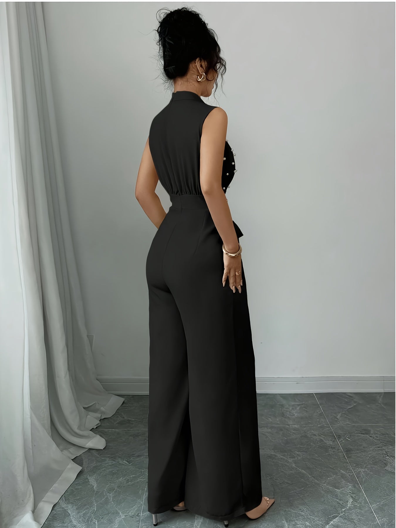 Sleeveless High-Neck Wide-Leg Jumpsuit