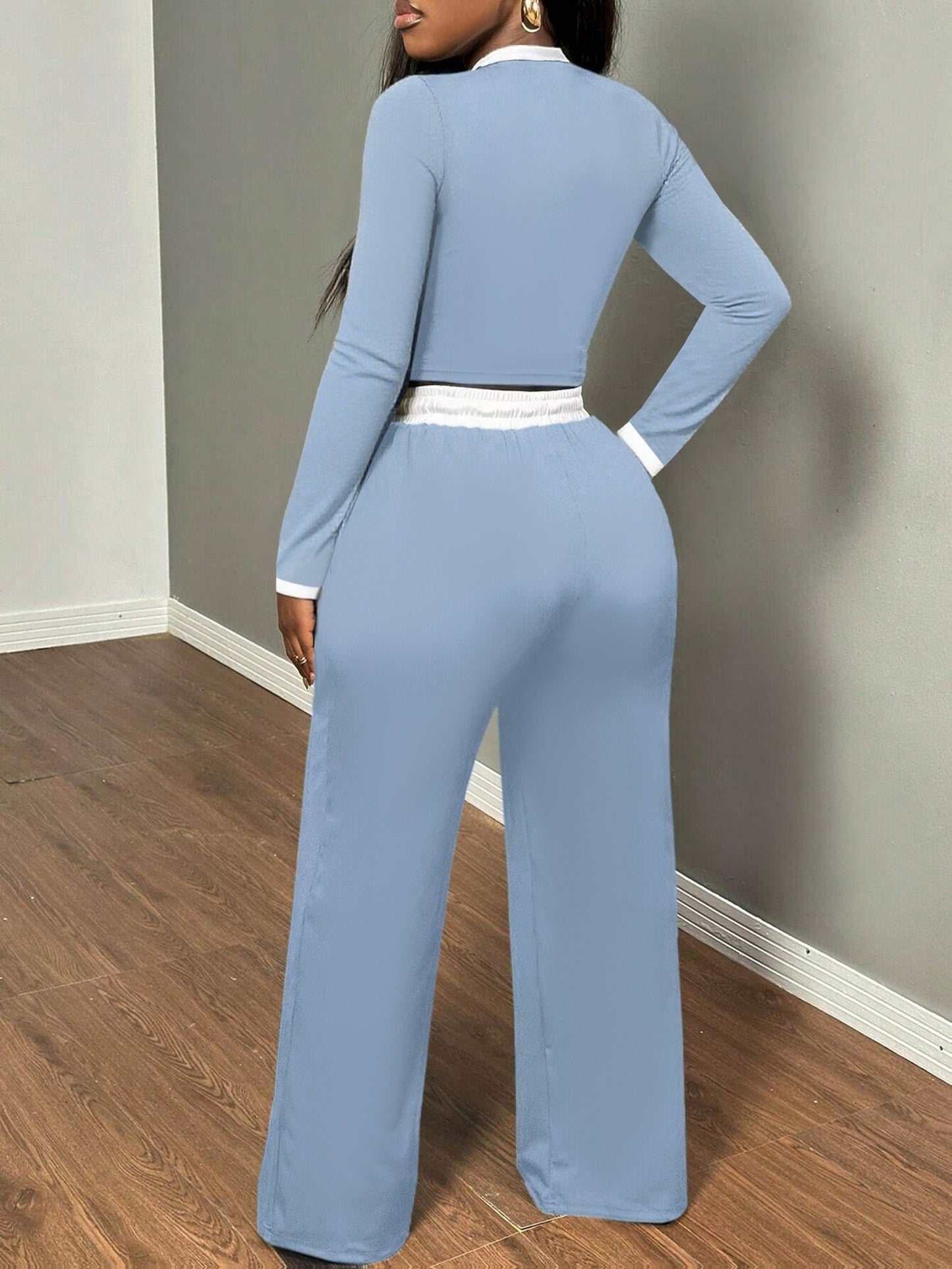 A Two-Piece Set Featuring a Sexy Color-Block Round-Neck Long-Sleeve T-Shirt Paired with High-Waisted Belted Trousers - ayq