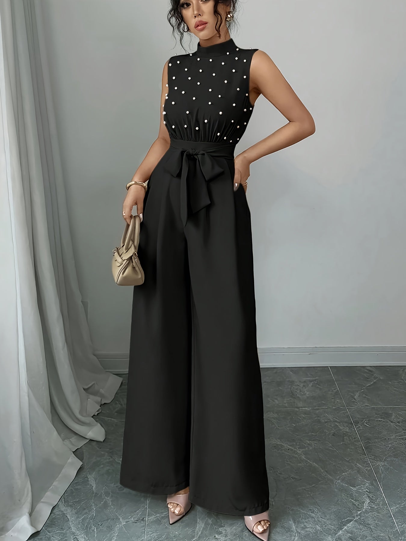Sleeveless High-Neck Wide-Leg Jumpsuit