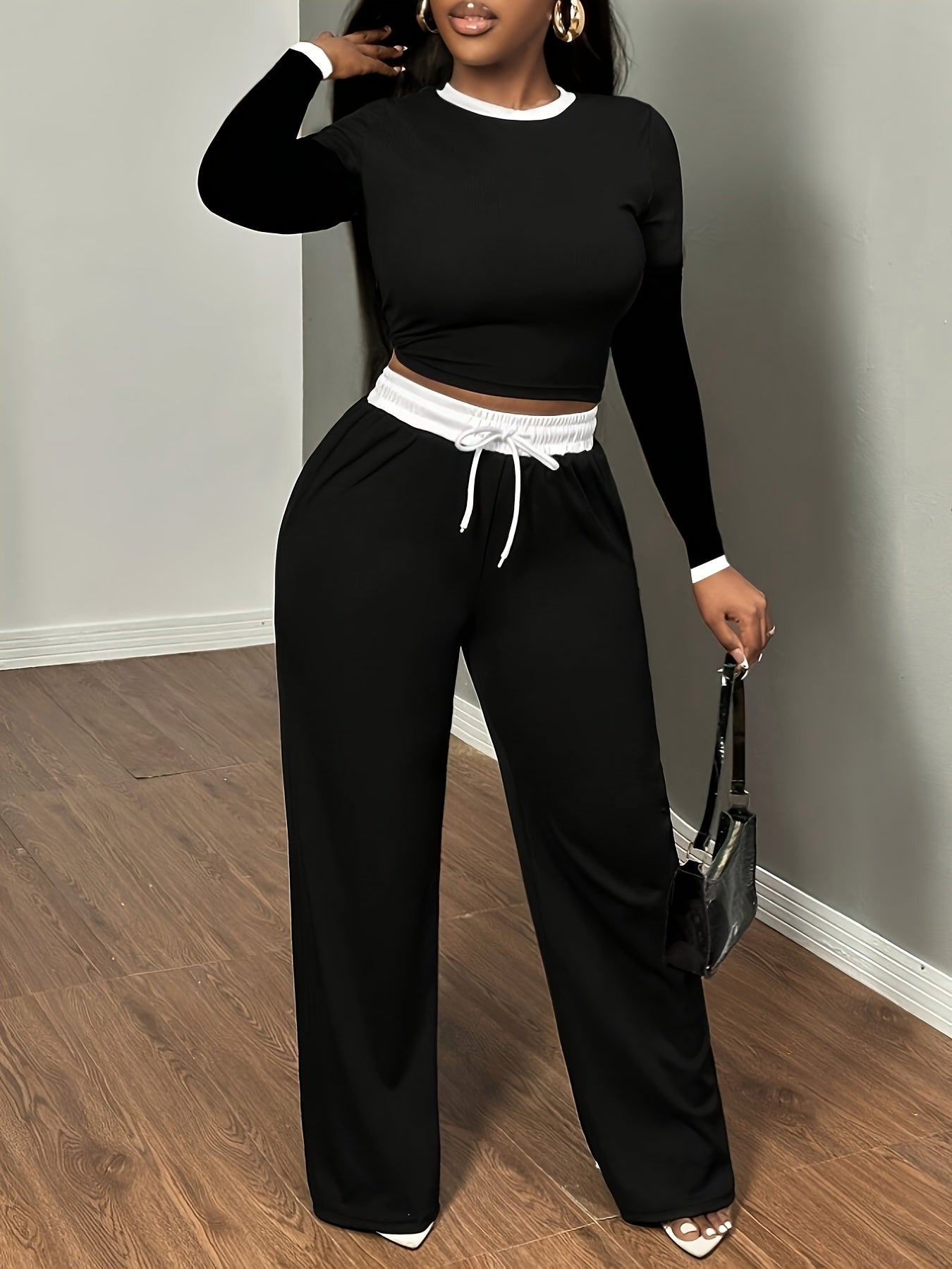 A Two-Piece Set Featuring a Sexy Color-Block Round-Neck Long-Sleeve T-Shirt Paired with High-Waisted Belted Trousers - ayq