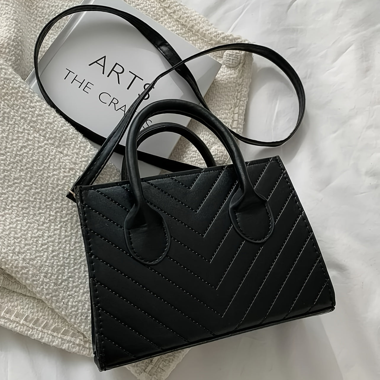 Stylish Blue Square Bag with a Chevron Design And a Bag Charm