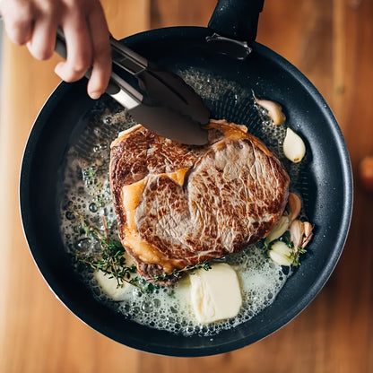 Sturdy Kitchen Tongs Made of Stainless Steel with Silicone Ends - Resistant to Heat, Equipped with a Locking Feature for a Secure Grip, Offered in Lengths of 17.78 cm, 22.86 cm, And 30.48 cm, in Black.