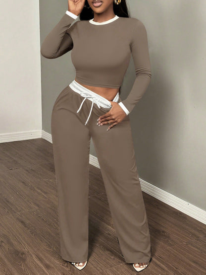 A Two-Piece Set Featuring a Sexy Color-Block Round-Neck Long-Sleeve T-Shirt Paired with High-Waisted Belted Trousers - ayq
