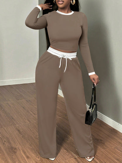 A Two-Piece Set Featuring a Sexy Color-Block Round-Neck Long-Sleeve T-Shirt Paired with High-Waisted Belted Trousers - ayq