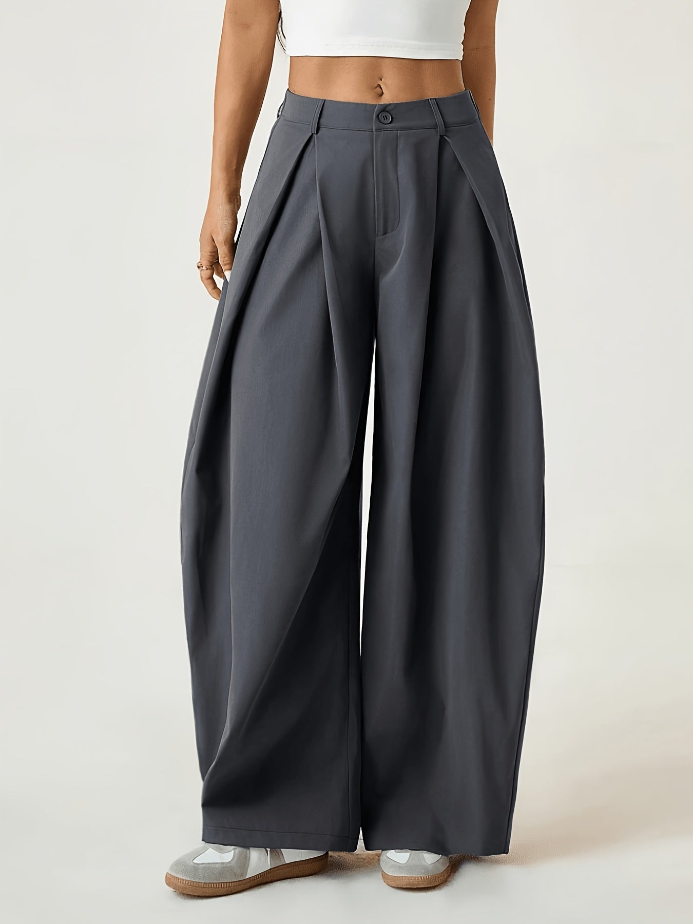 Elegant Wide-Leg Trousers with Curved Hem and Smock Detail