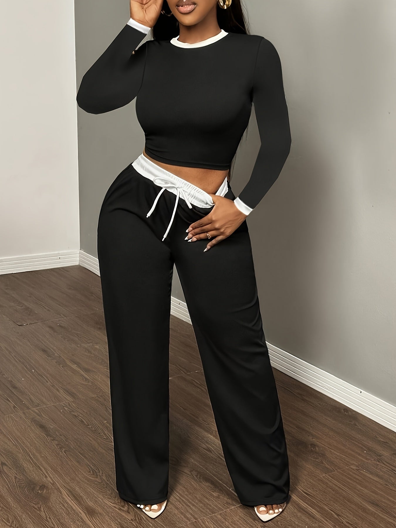 A Two-Piece Set Featuring a Sexy Color-Block Round-Neck Long-Sleeve T-Shirt Paired with High-Waisted Belted Trousers - ayq