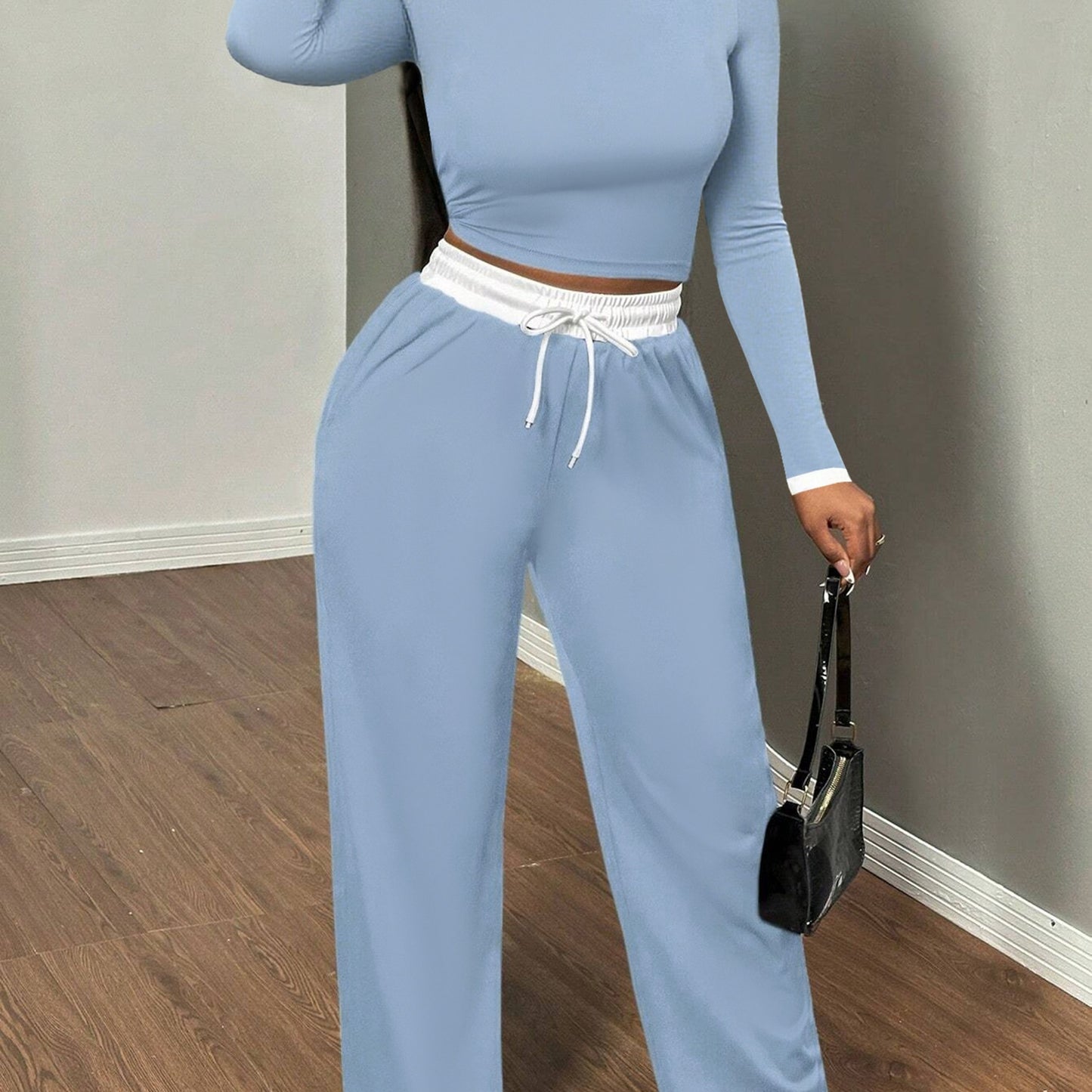 A Two-Piece Set Featuring a Sexy Color-Block Round-Neck Long-Sleeve T-Shirt Paired with High-Waisted Belted Trousers - ayq