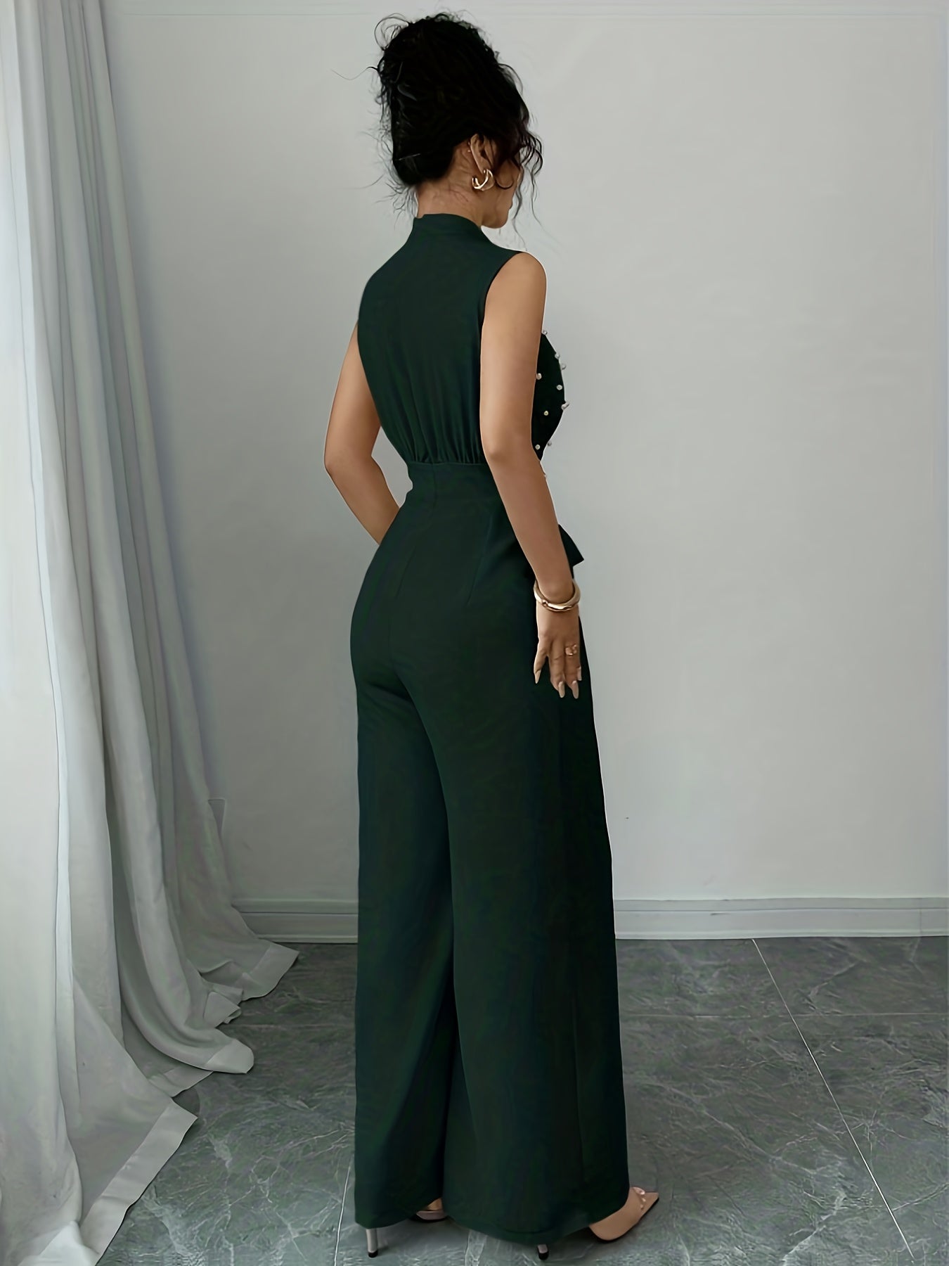 Sleeveless High-Neck Wide-Leg Jumpsuit