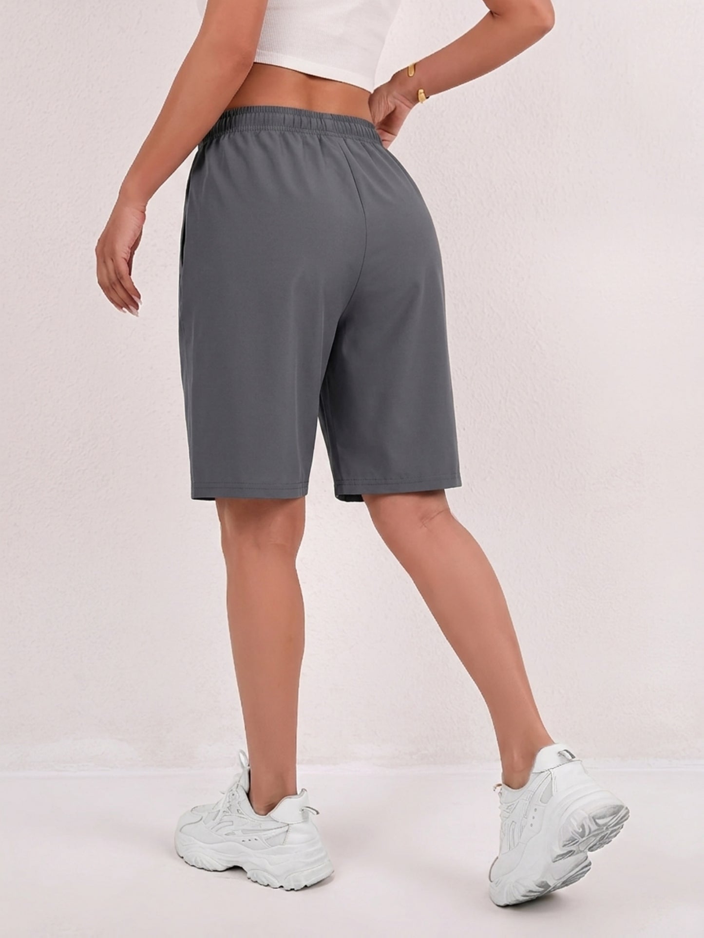 Women's Loose-Fit Quick-Dry Sports Shorts with Zipper Pockets