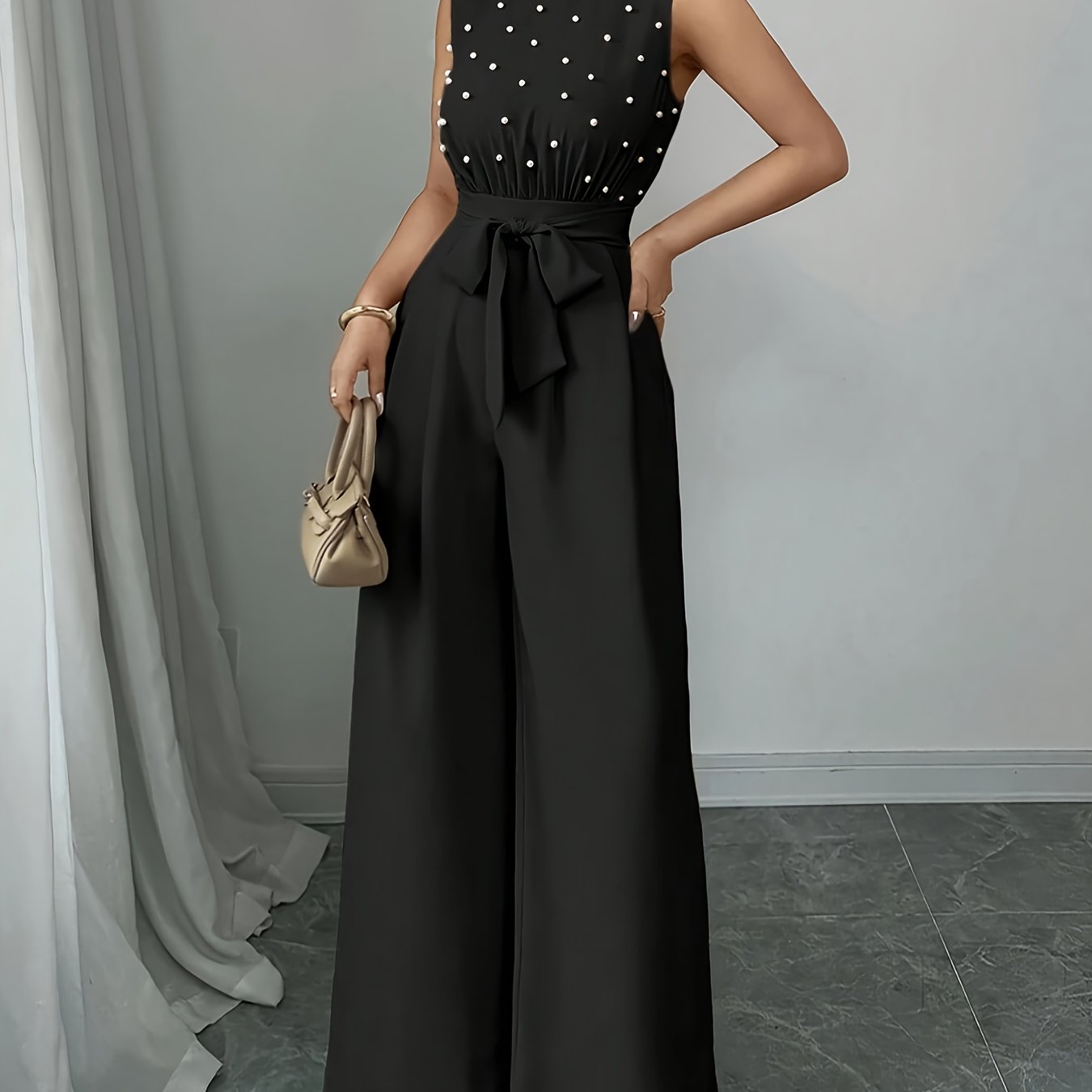 Sleeveless High-Neck Wide-Leg Jumpsuit