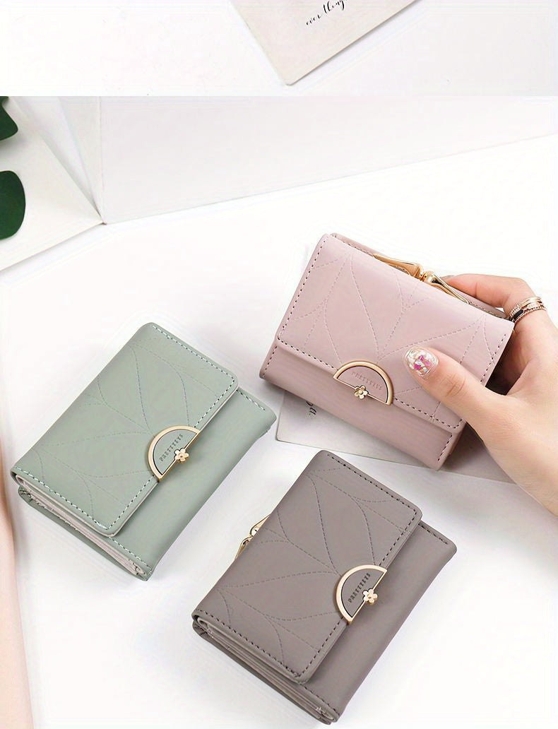 Compact Trifold Wallet for Women in Mint Green Featuring a Golden Clasp And Zippered Coin Compartment, Adorned with a Floral Pattern And Designed for Multiple Card Storage