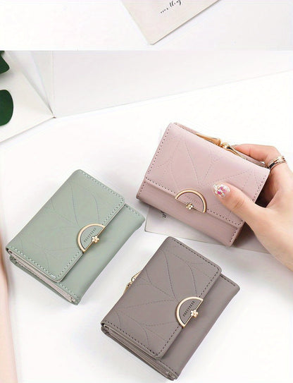 Compact Trifold Wallet for Women in Mint Green Featuring a Golden Clasp And Zippered Coin Compartment, Adorned with a Floral Pattern And Designed for Multiple Card Storage